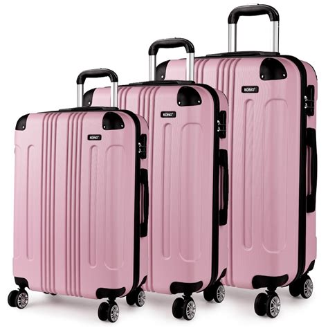 pink hard shell luggage.